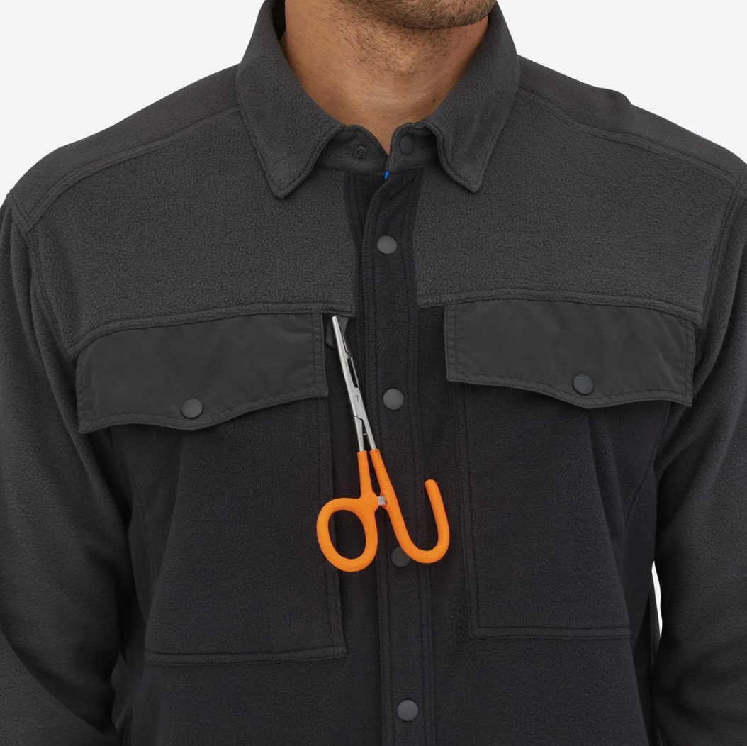 Lightweight Patagonia outdoor shirt with chest pockets—available now.