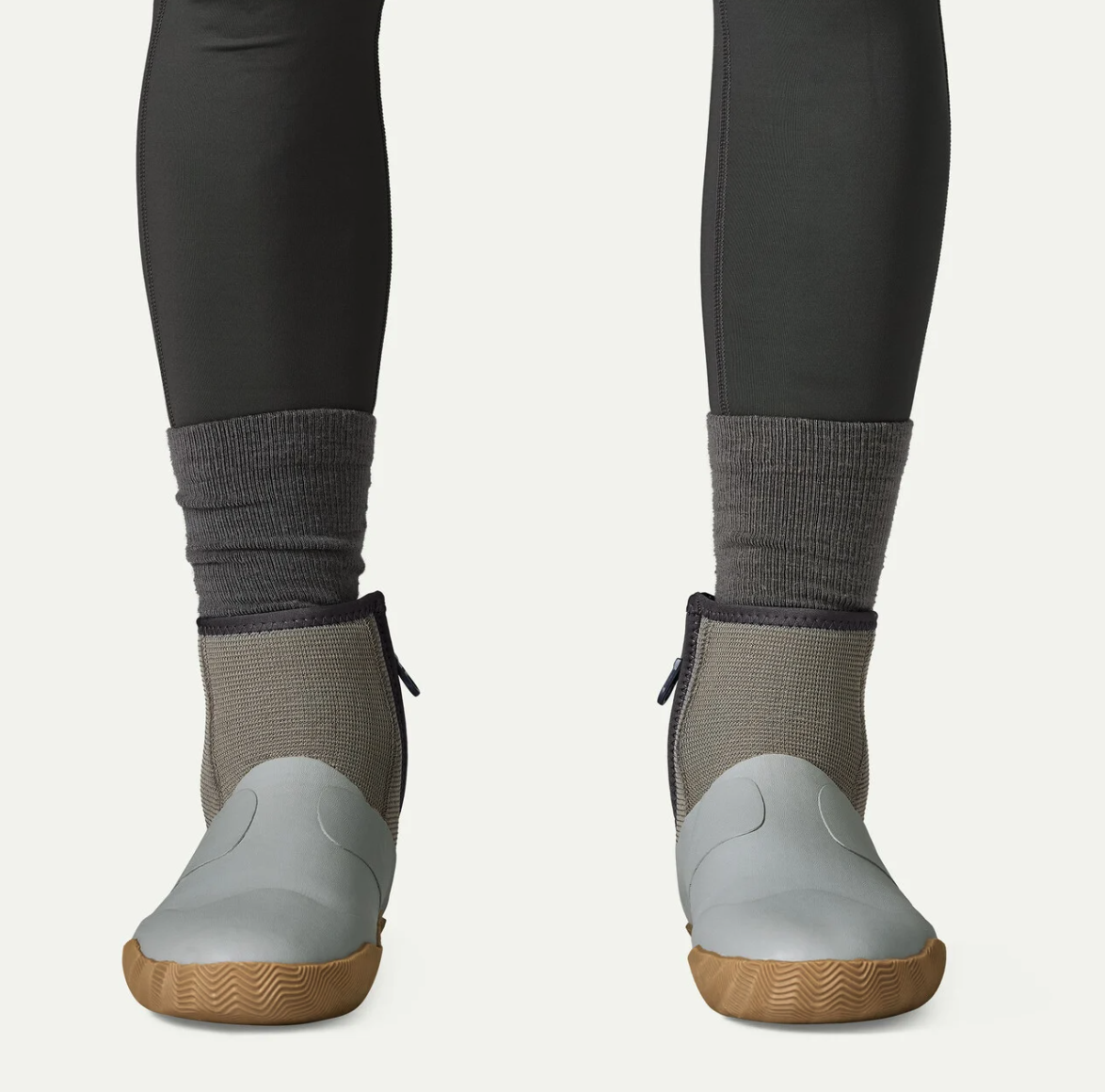 Front view of Patagonia Salt Wading Booties worn with socks, featuring protective rubber toes for tropical flats fishing.