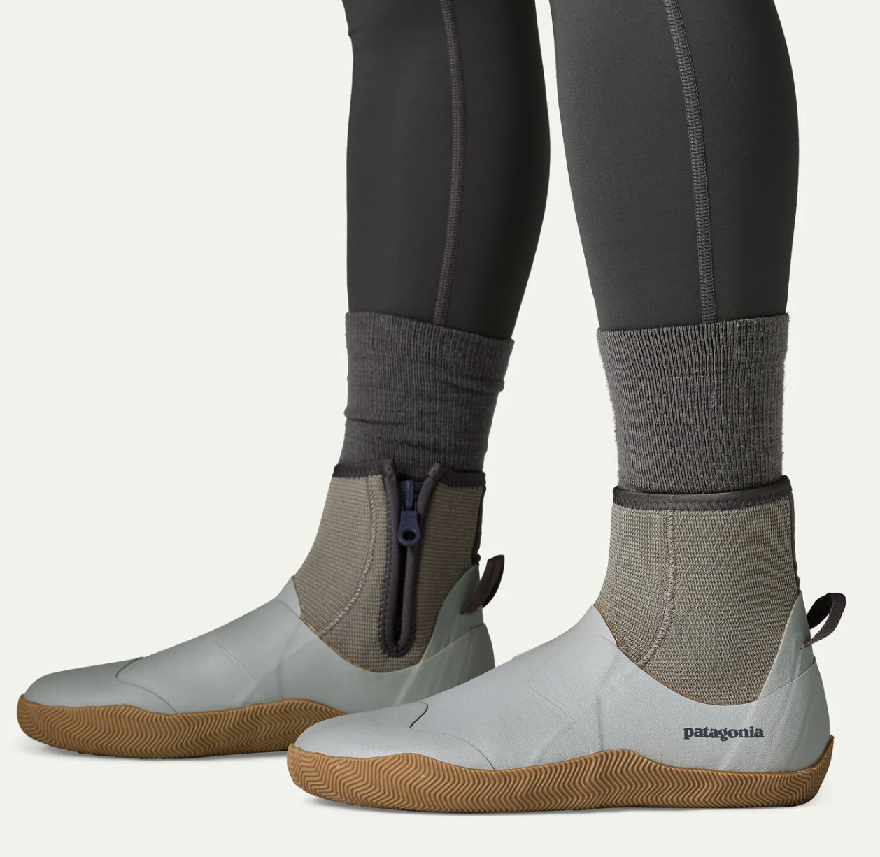 Side view of Patagonia Salt Wading Booties worn for flats fishing, featuring quick-draining uppers and side zippers.