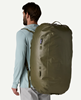 Man wearing Patagonia Guidewater Duffel 80L as backpack