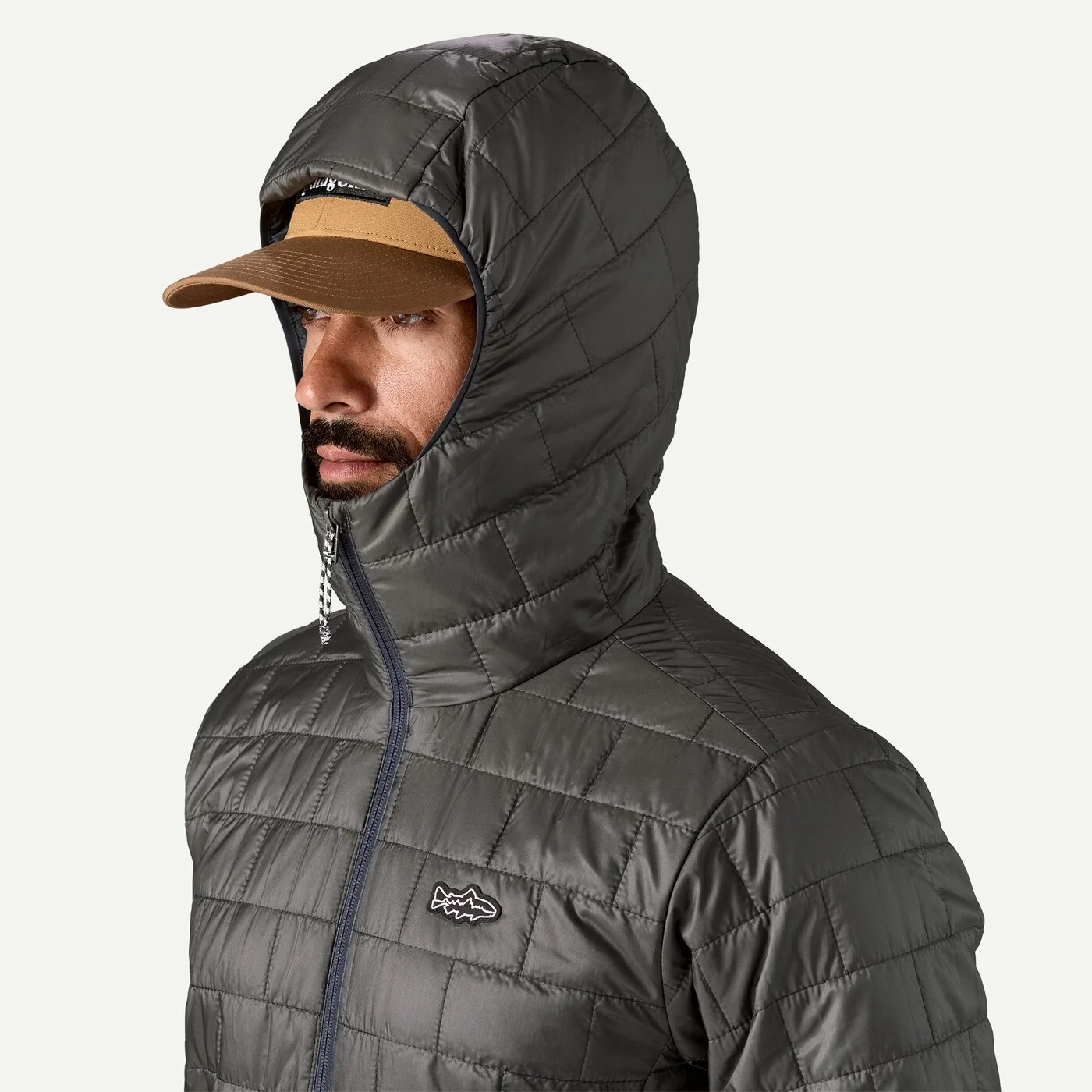 Patagonia Nano Puff hood fits over a ball cap for warm, packable insulation during fishing and hiking