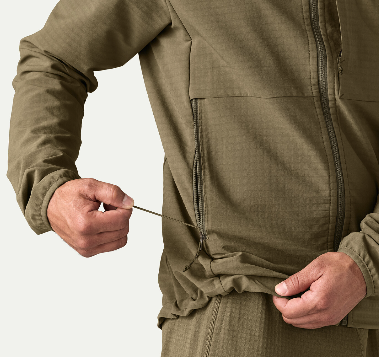 Elastic hem on  Patagonia R1 TechFace Fitz Roy Trout Hoody Dark Ash.