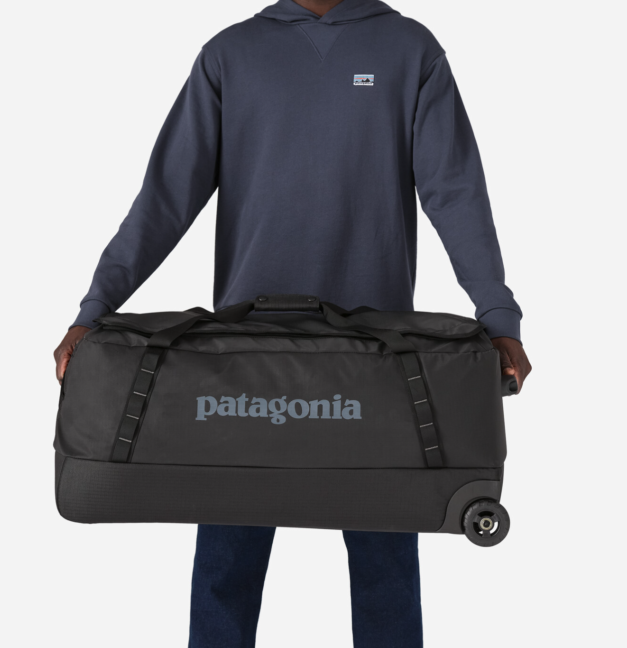 Close-up of the durable material on Patagonia Black Hole Matte Wheeled Duffel 100L, built to withstand tough conditions.