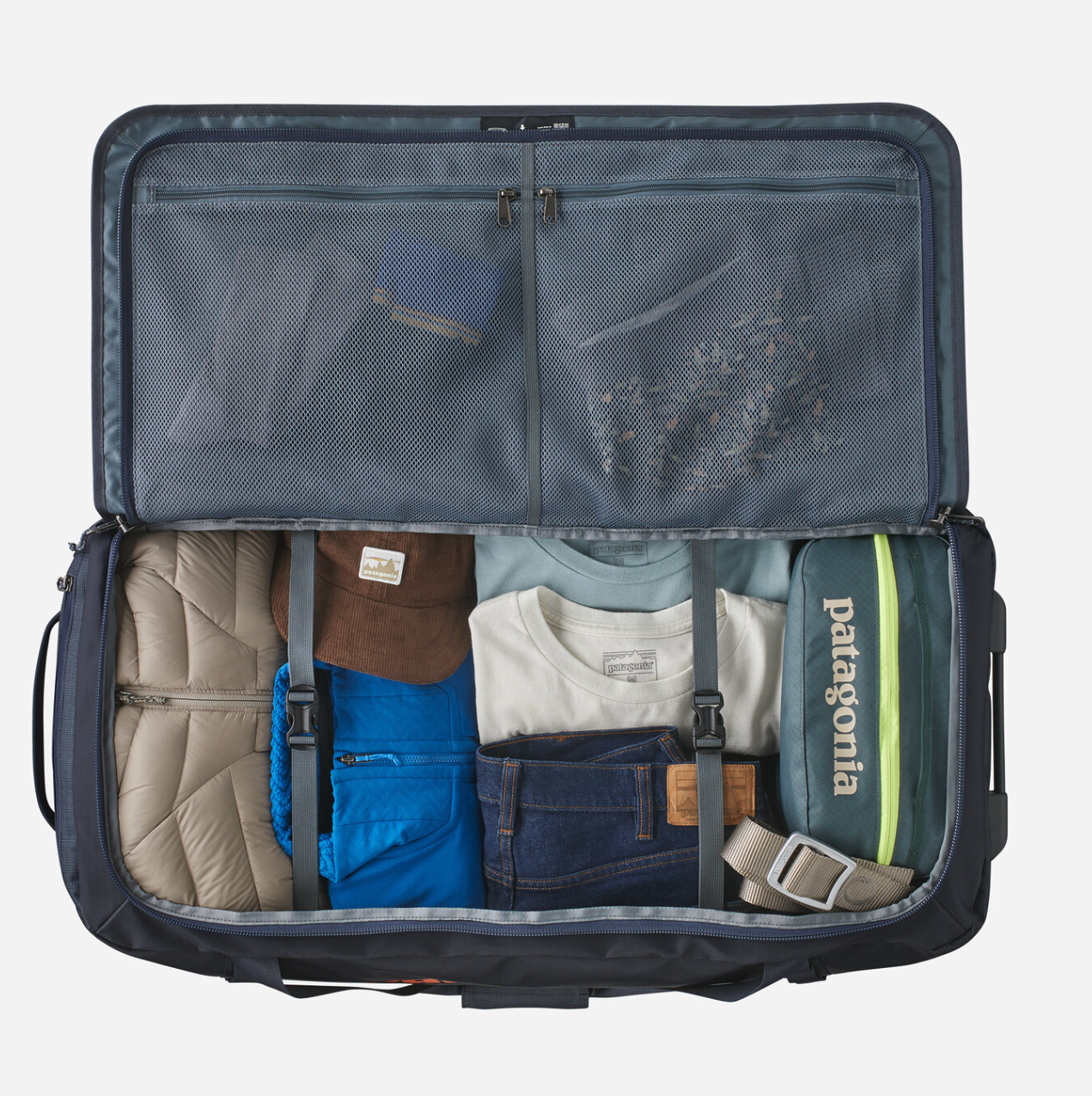 Interior view of the Patagonia Black Hole Matte Wheeled Duffel, showcasing ample storage for gear.