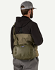Rear of angler with  Patagonia Guidewater Hip Pack Basin Green around waist.