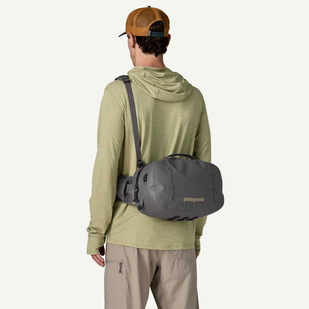 Patagonia Guidewater Switch Pack 12L worn as a fishing hip pack for secure waterproof gear storage