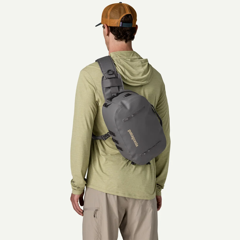 Patagonia Guidewater Switch Pack 12L worn as a waterproof fishing sling pack for river and saltwater use
