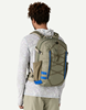 Man wearing Patagonia Stealth Backpack 25L.