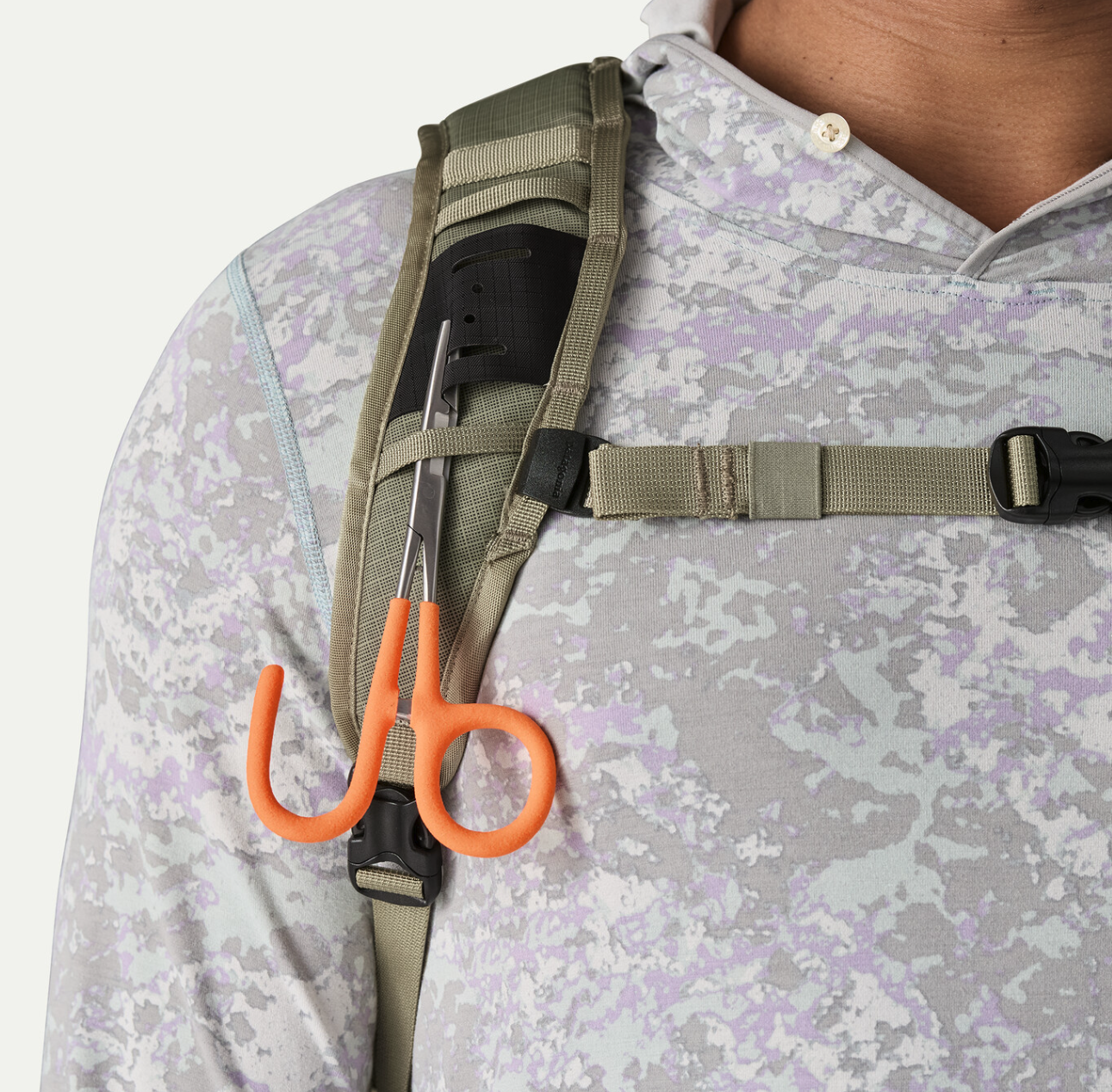 Hemostat hanging on strap of Patagonia Stealth Backpack 25L