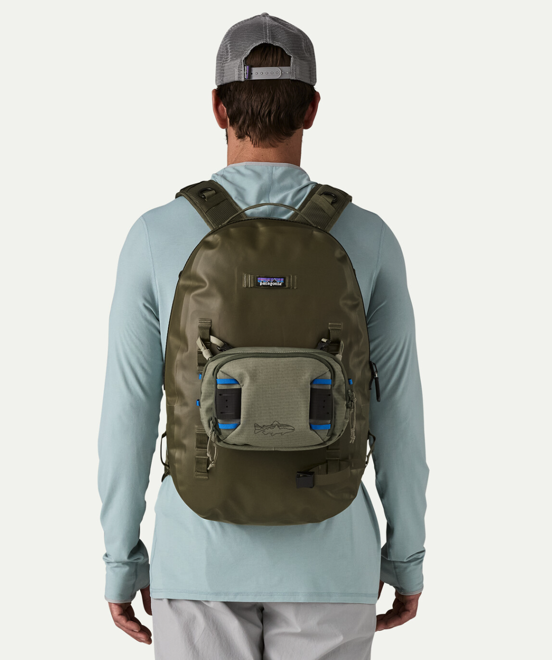 Patagonia Stealth Switch Fishing Pack 5L River Rock Green Color on man wearing backpack.