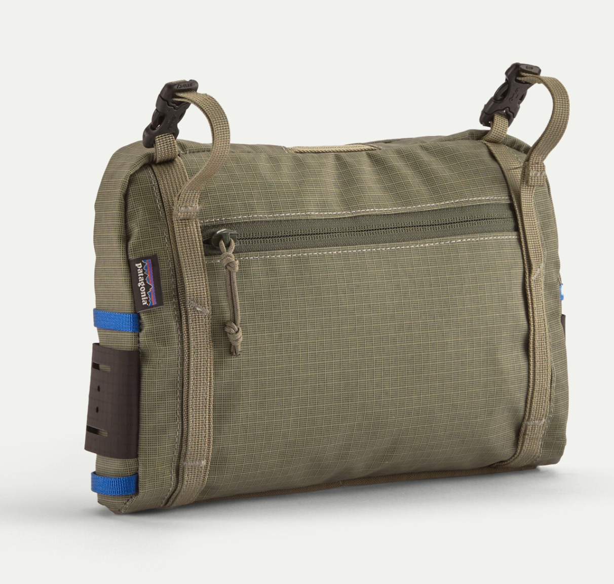 Back of Patagonia Stealth Switch Fishing Pack 3L in river rock green color.
