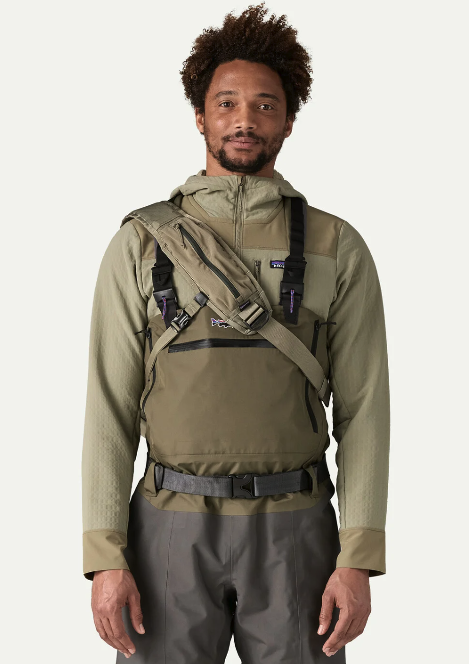 Front of model wearing Patagonia Stealth Switch Fishing Pack 9L over shoulder