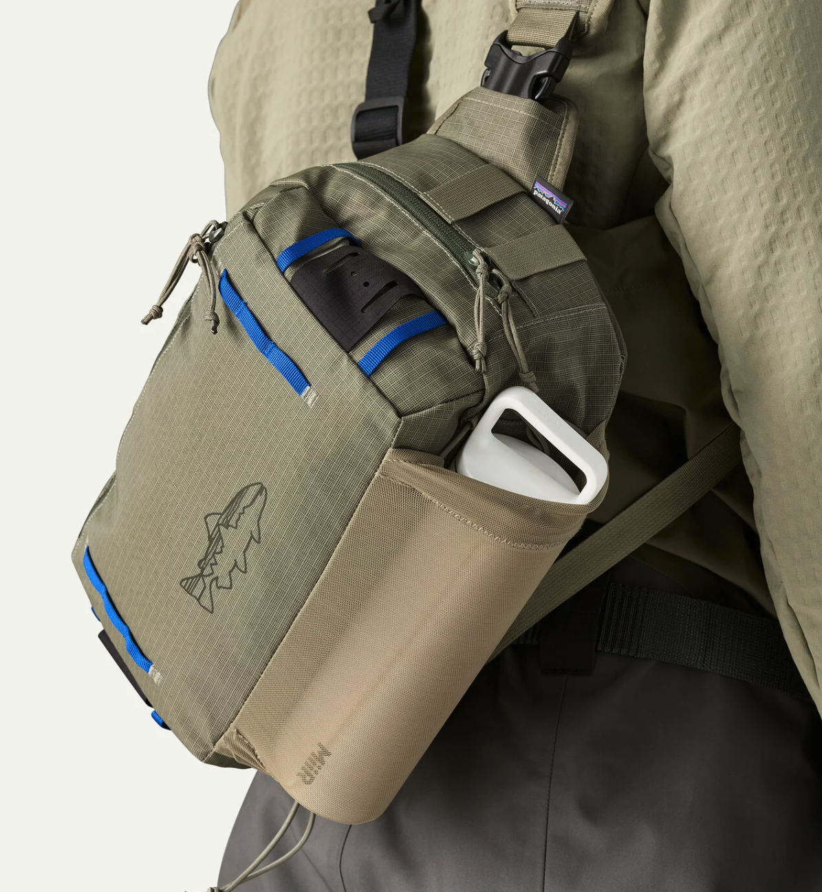 Water bottle in holder of Patagonia Stealth Switch Fishing Pack 9L