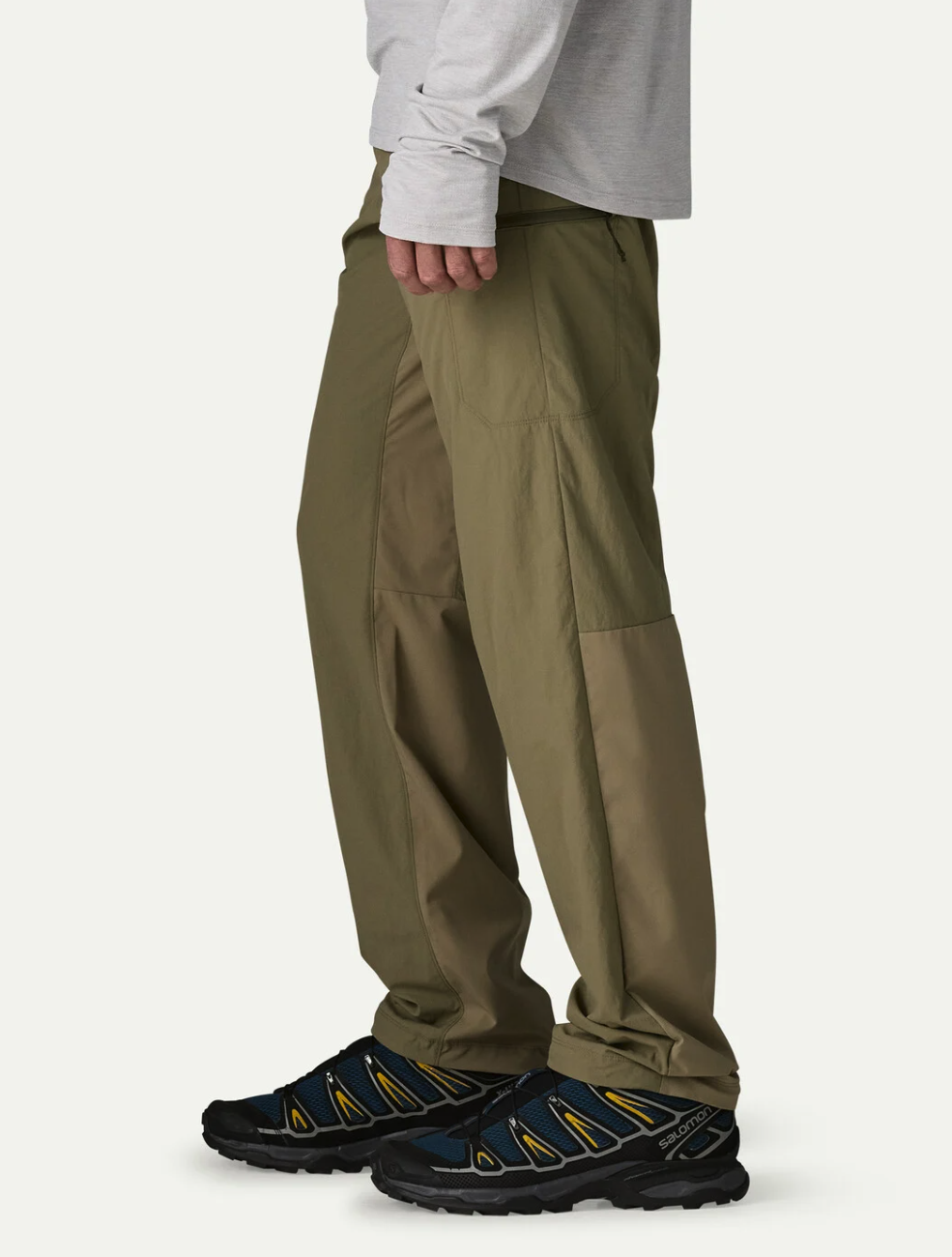 Side of model wearing Patagonia Men's Sandy Cay Pants