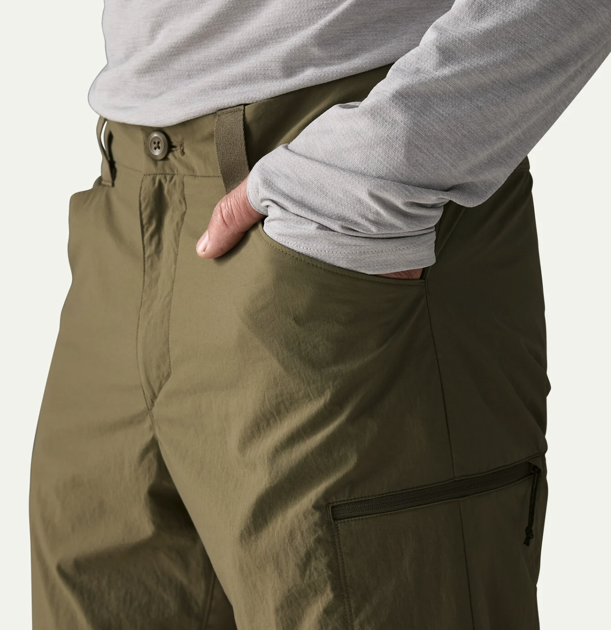 Model with hands in pockets of Patagonia Men's Sandy Cay Pants
