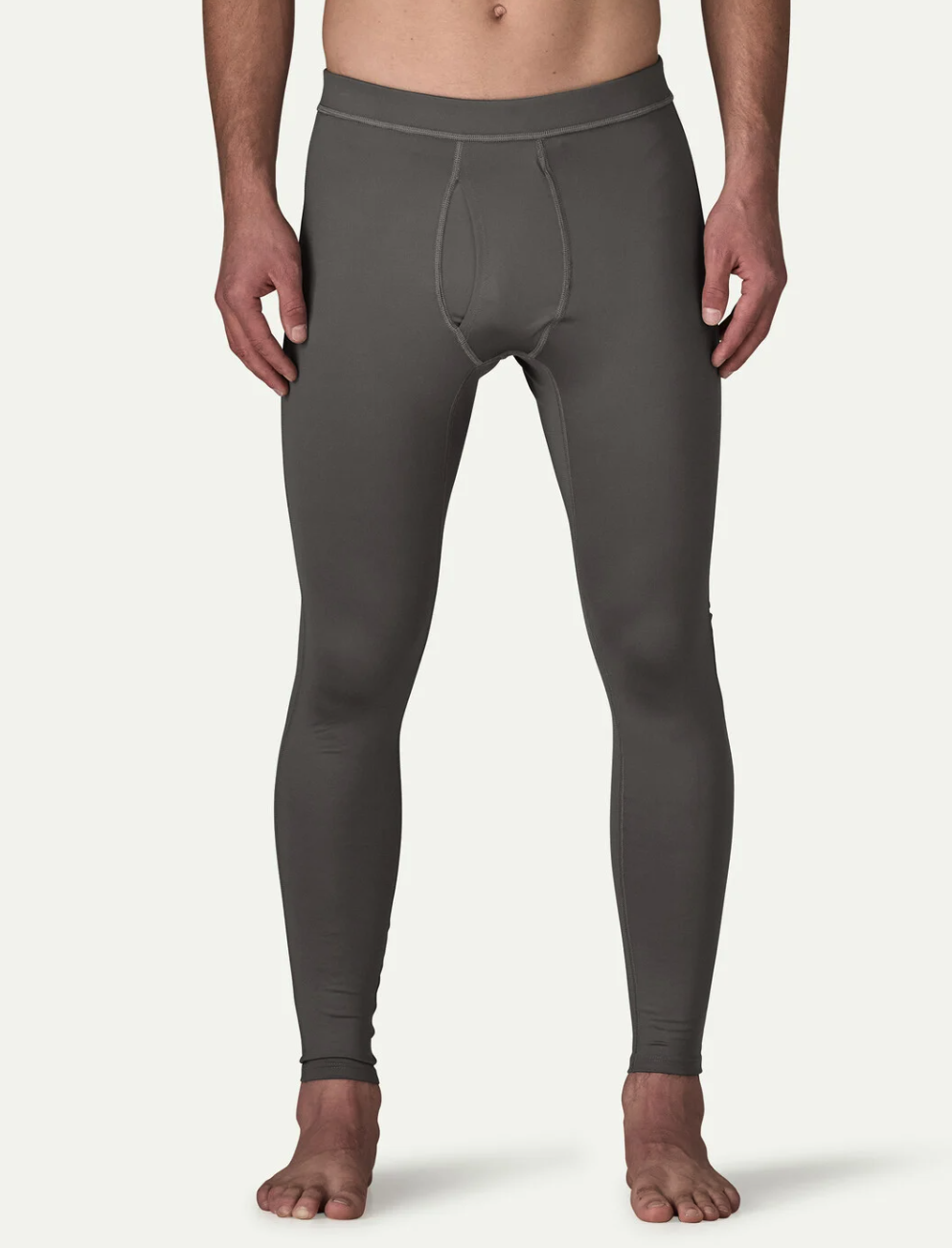 Front of model wearing Patagonia Men's Tropic Comfort Sun Tights