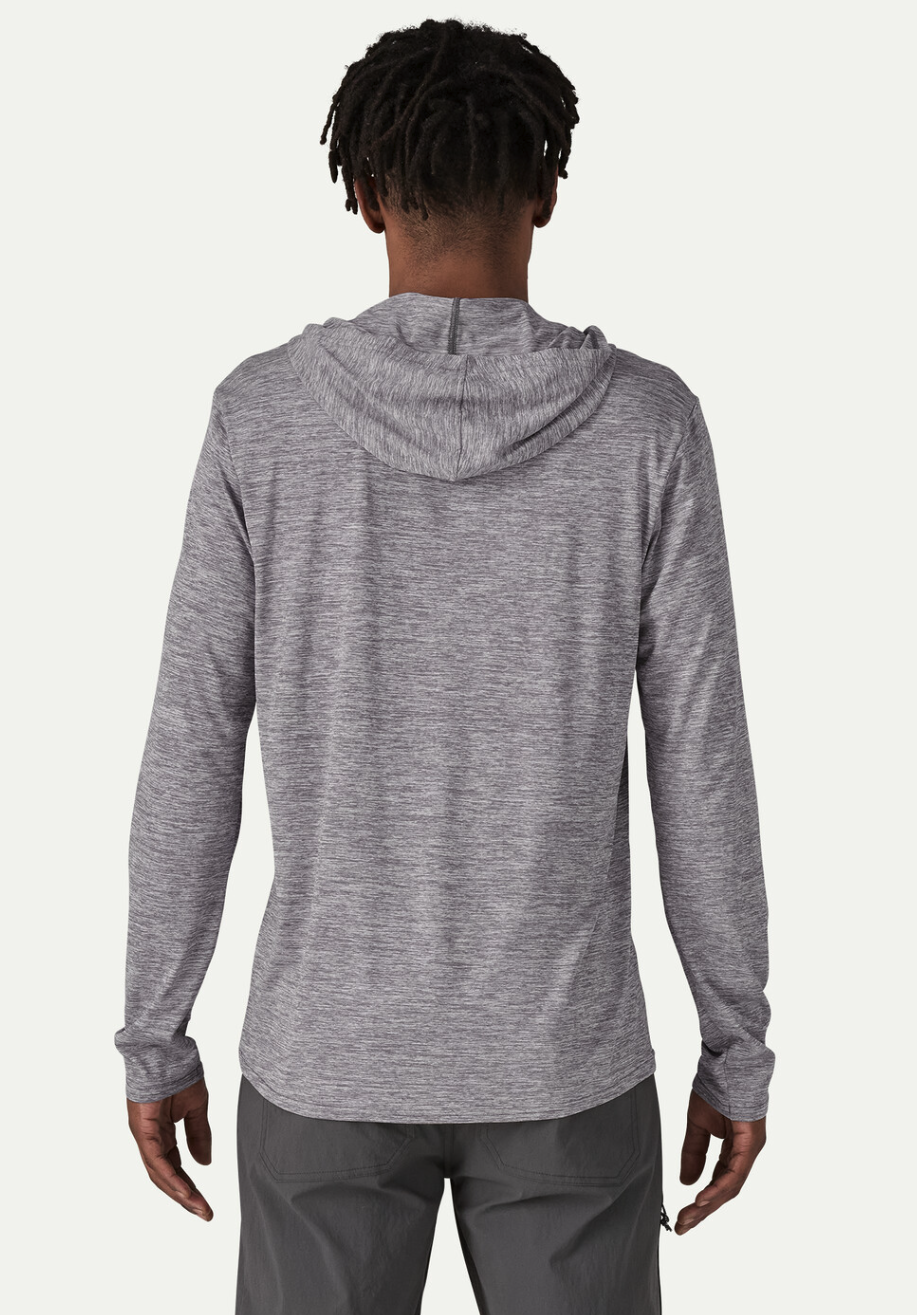 Rear view of model wearing Patagonia Capilene Cool Daily Hoody.