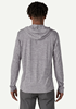 Rear view of model wearing Patagonia Capilene Cool Daily Hoody.