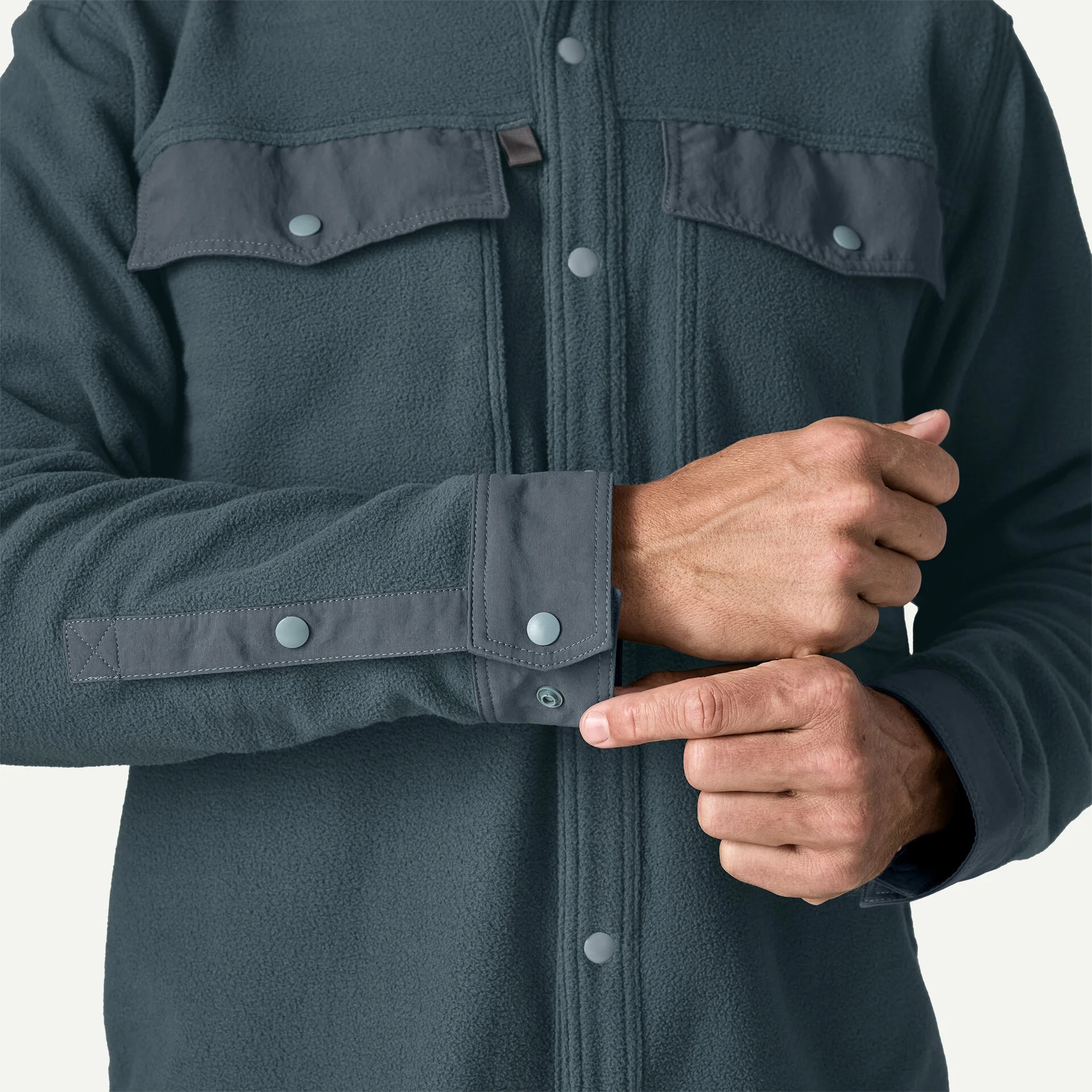 Patagonia recycled microfleece shirt cuff with durable trim designed to reduce water uptake