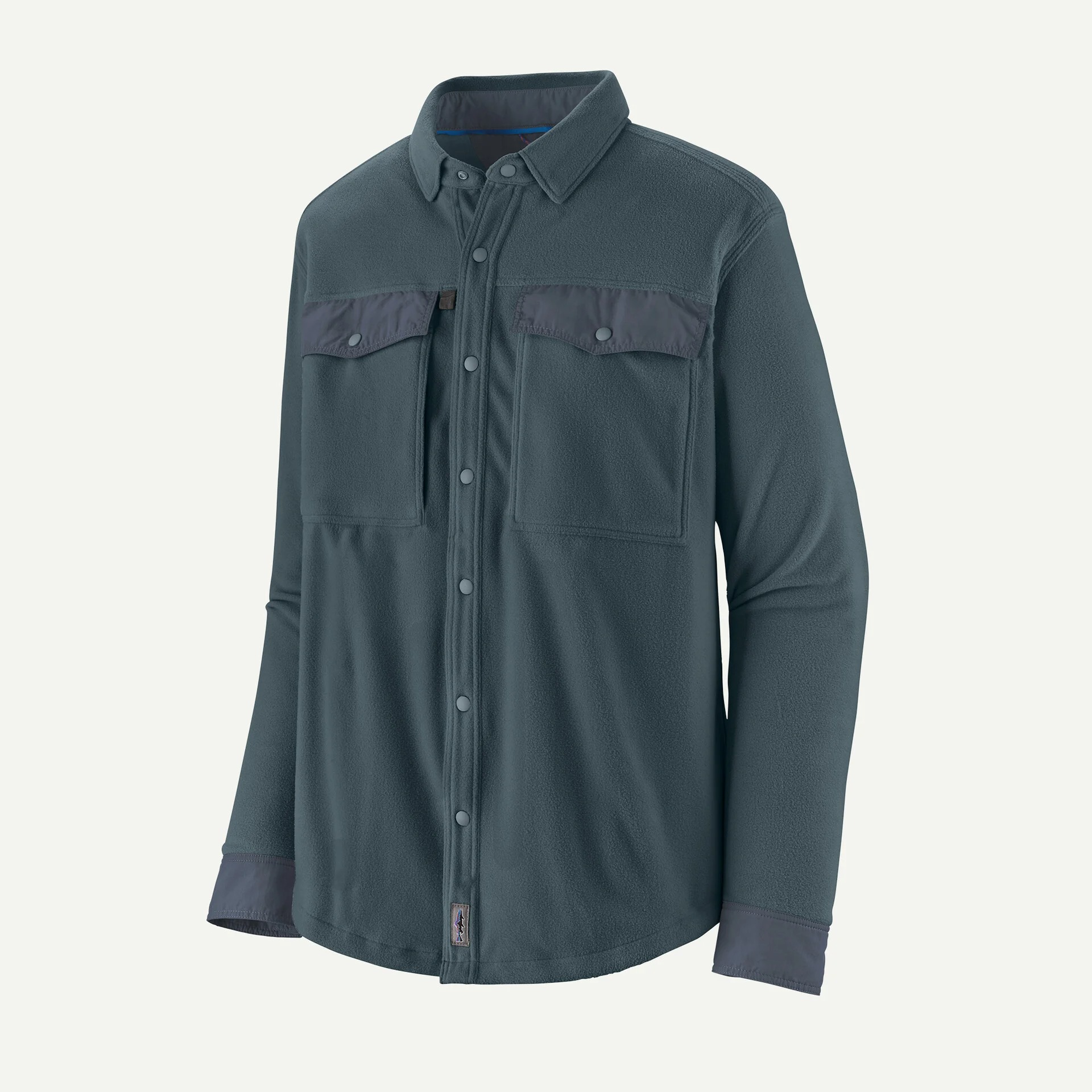 Men’s blue Patagonia fleece fishing shirt with snap front and fly box chest pockets