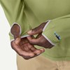 Model showing the thumb loops of the  Patagonia Tropic Comfort Natural Hoody