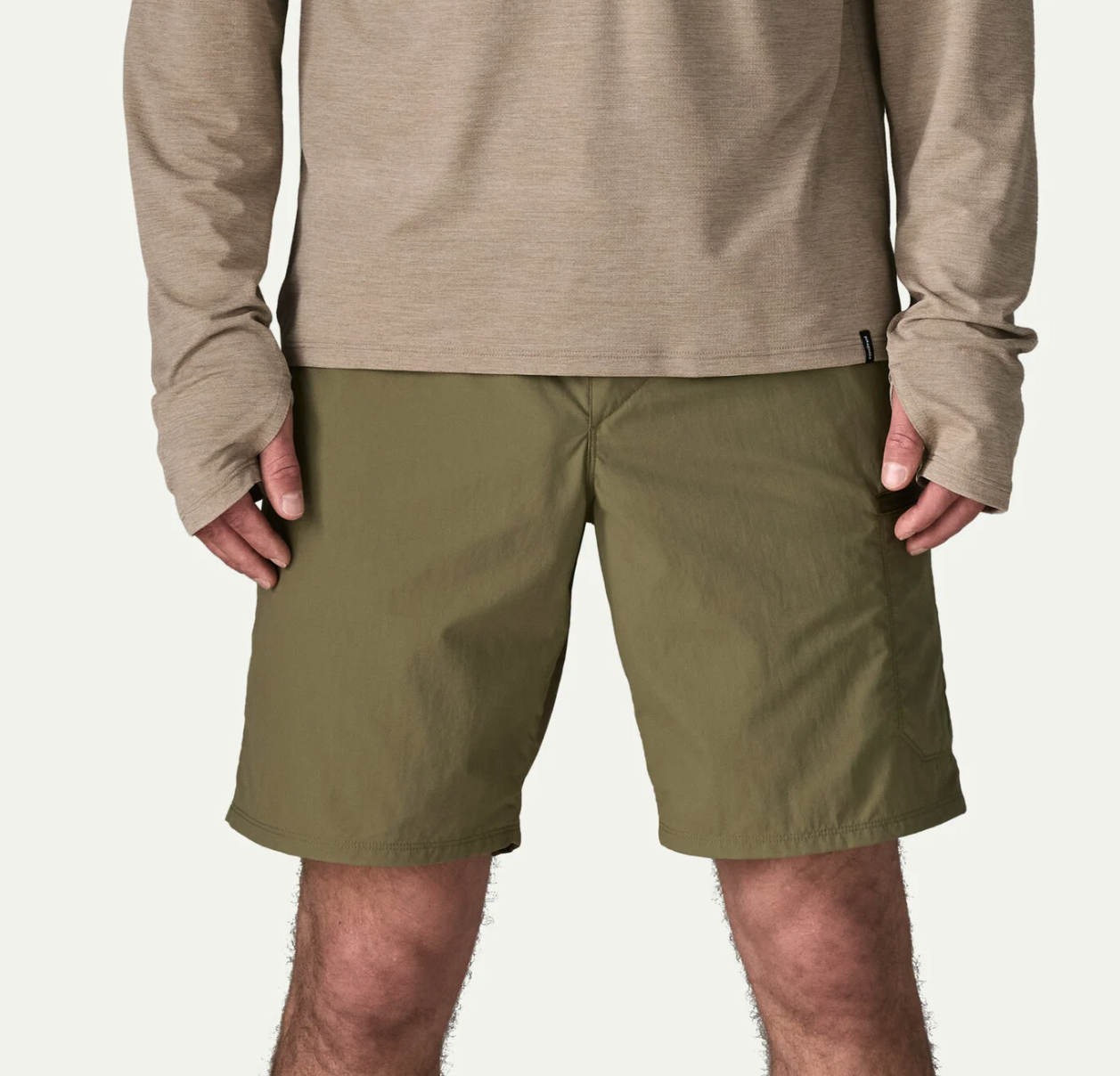 Front of model wearing Patagonia Sandy Cay Shorts Sage Khaki