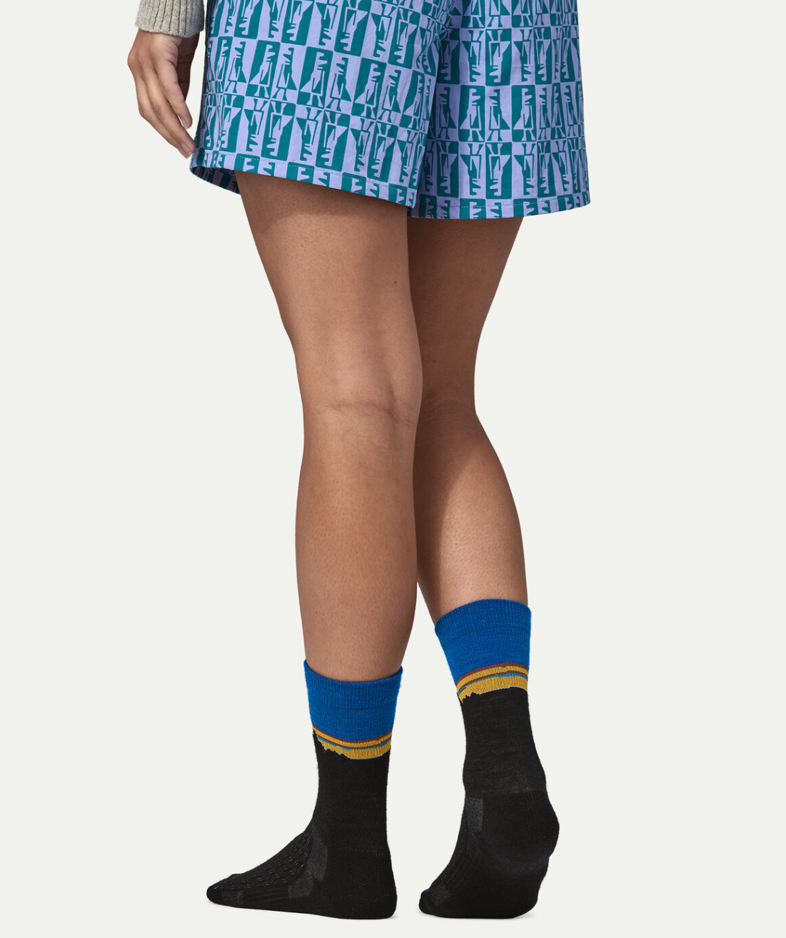 Rear view of Patagonia Merino Wool Blend Crew Socks in Classic Fitz Roy Viking Blue color on model.