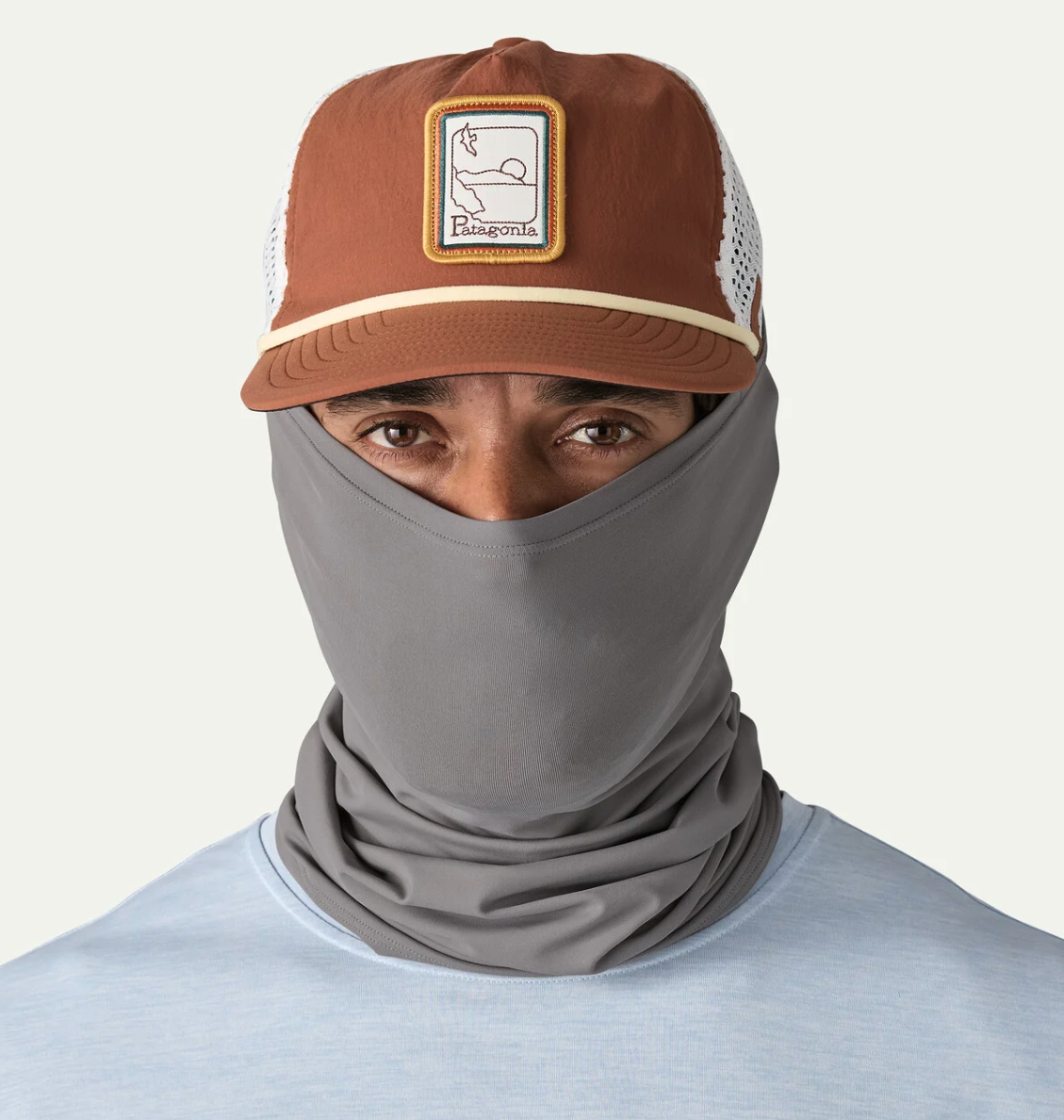 Model with Patagonia Sun Mask up on face