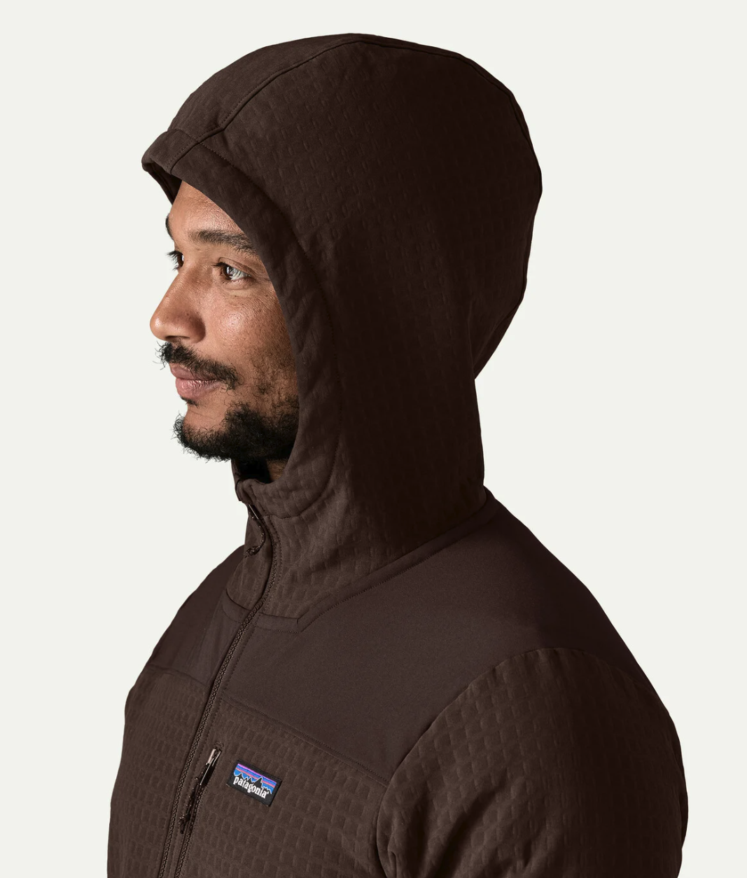 Patagonia R2 TechFace men's hooded half zip fishing fleece showing protective hood and reinforced shoulder panels