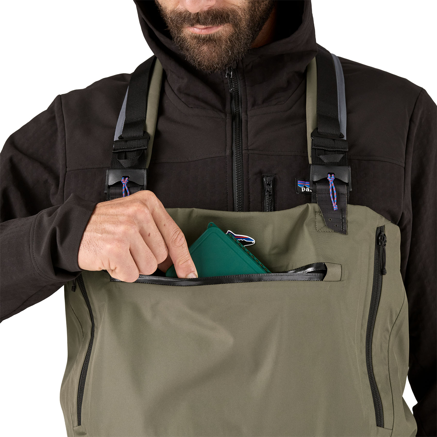 Model showing storage pocket on the chest of Patagonia's Swiftcurrent Expedition Wader