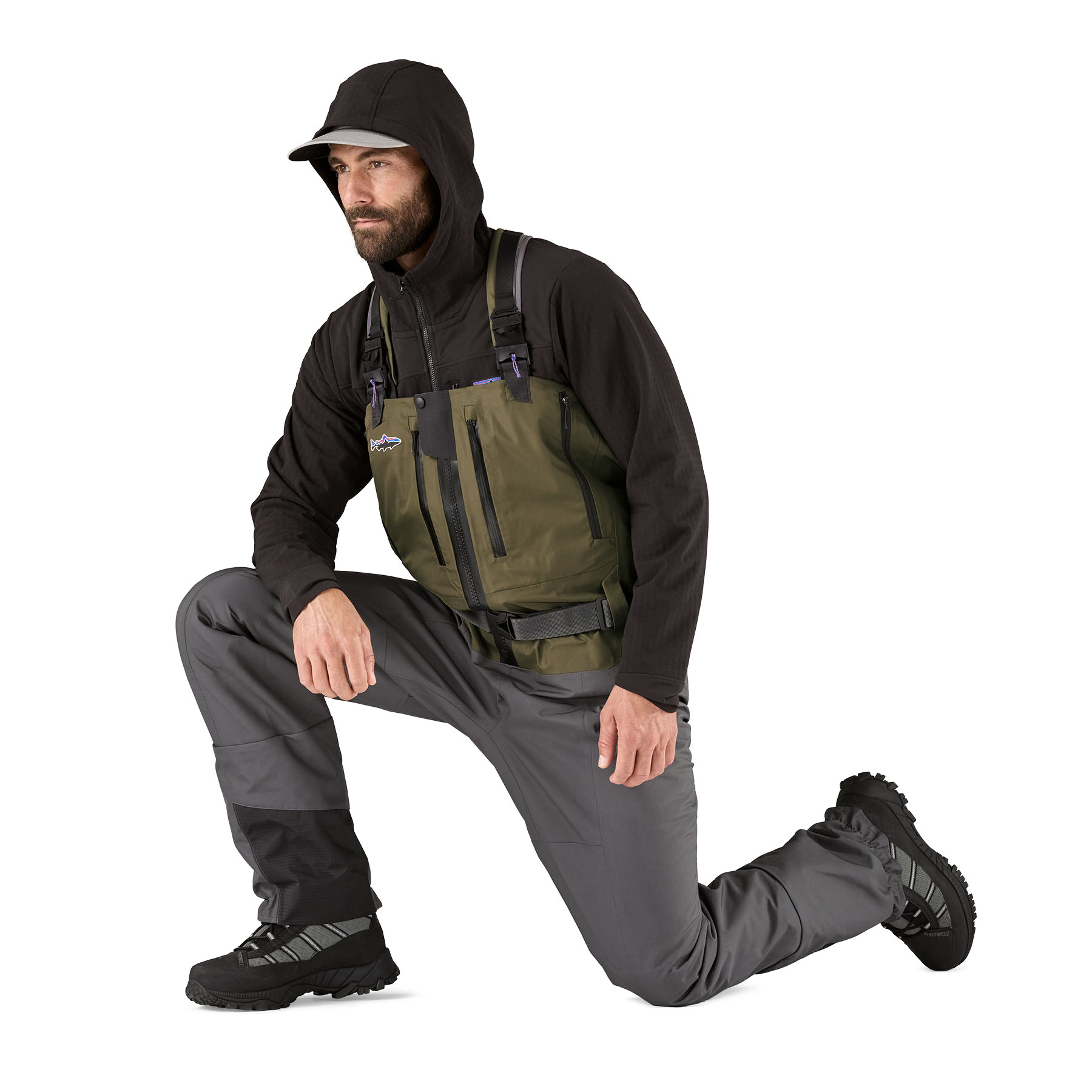 Model showing range of leg motion for Patagonia's Swiftcurrent Expedition Zip-Front Wader