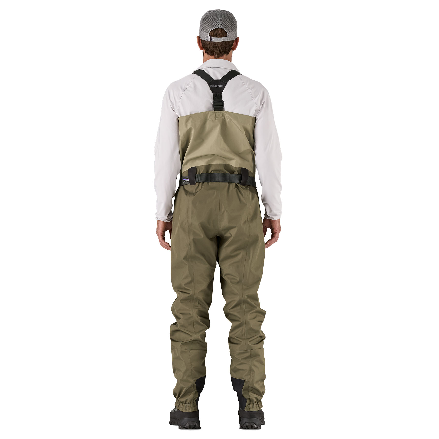 Model wearing and showing the back of Patagonia's Swiftcurrent Traverse Zip-Front Wader