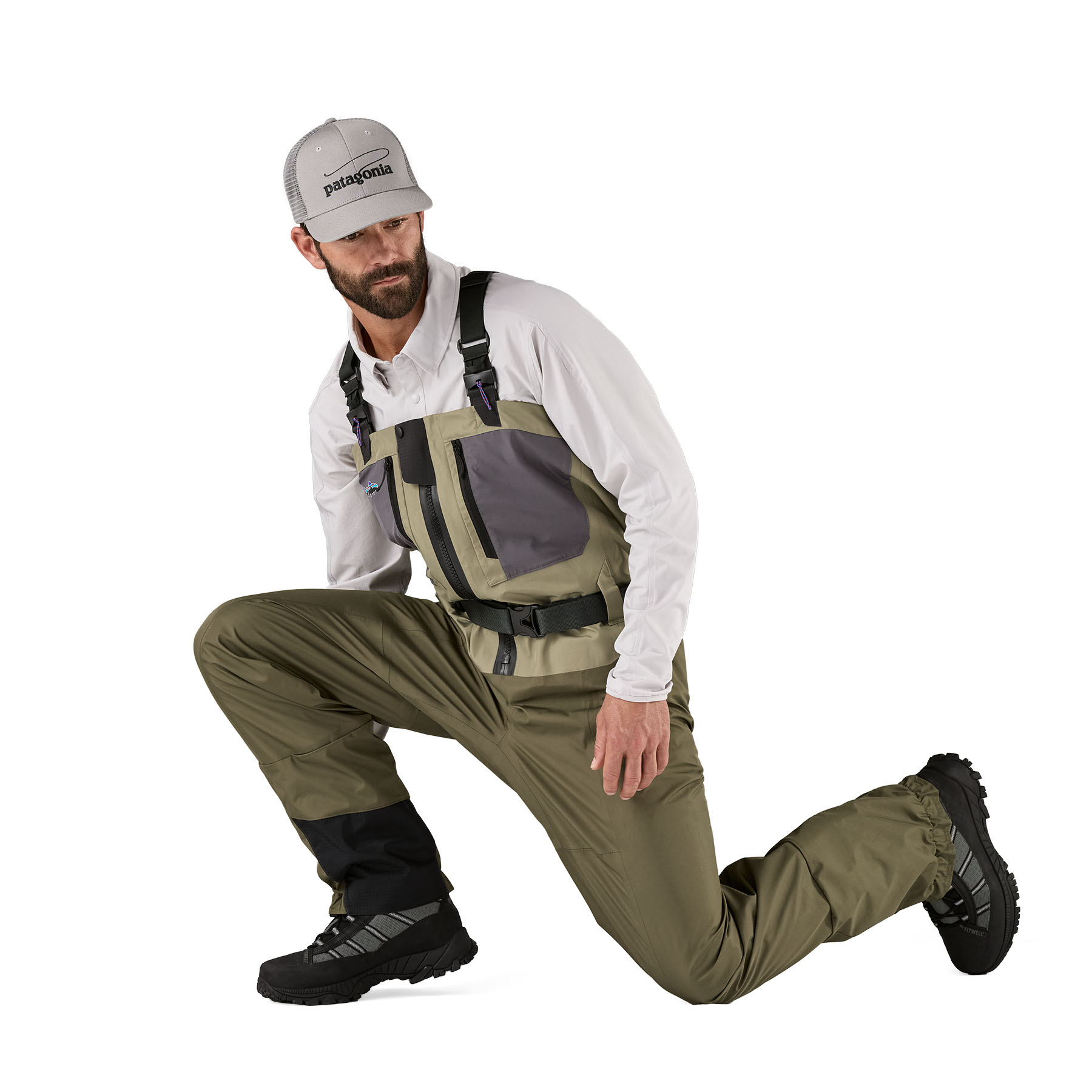 Model showing range of leg motion for Patagonia Swiftcurrent Traverse Zip-Front Wader