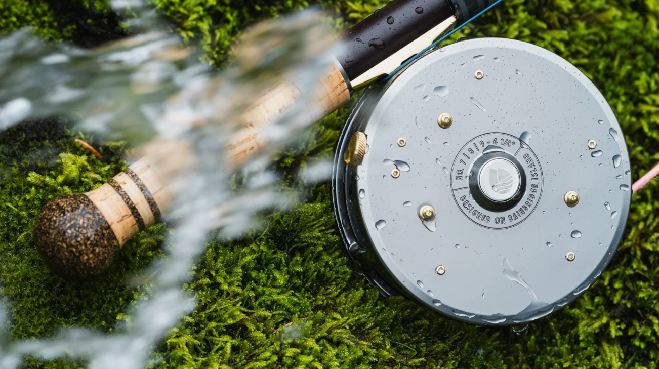 Redington Classic Spey Fly Reel laying in grass