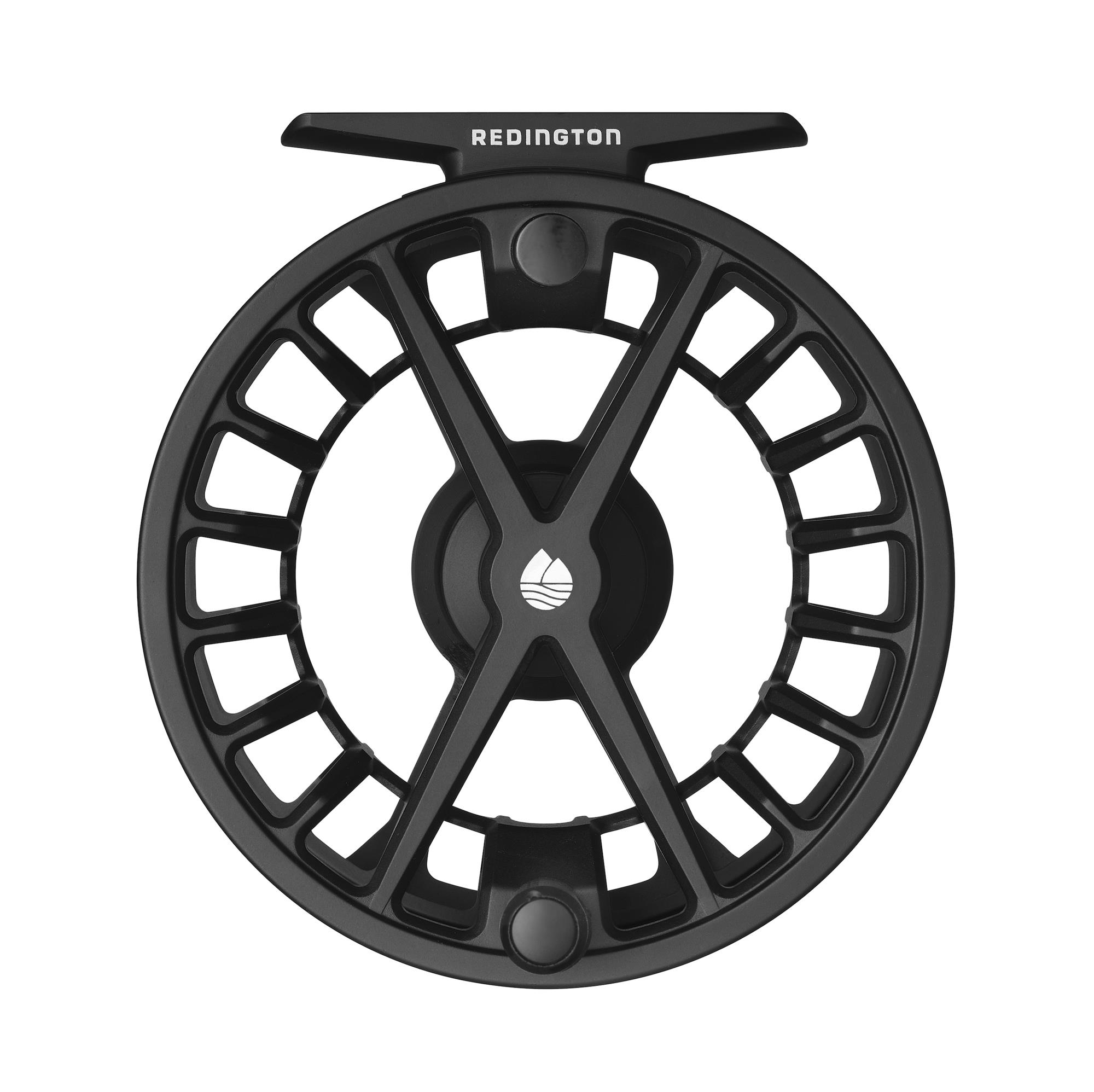 Redington Factor Black Fly Reel front view showing large arbor spool, ergonomic handle, and black finish.