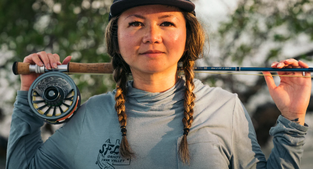 Artist holding rod with Redington GRANDE 9/10/11 Limited Edition Tarpon Fly Reel