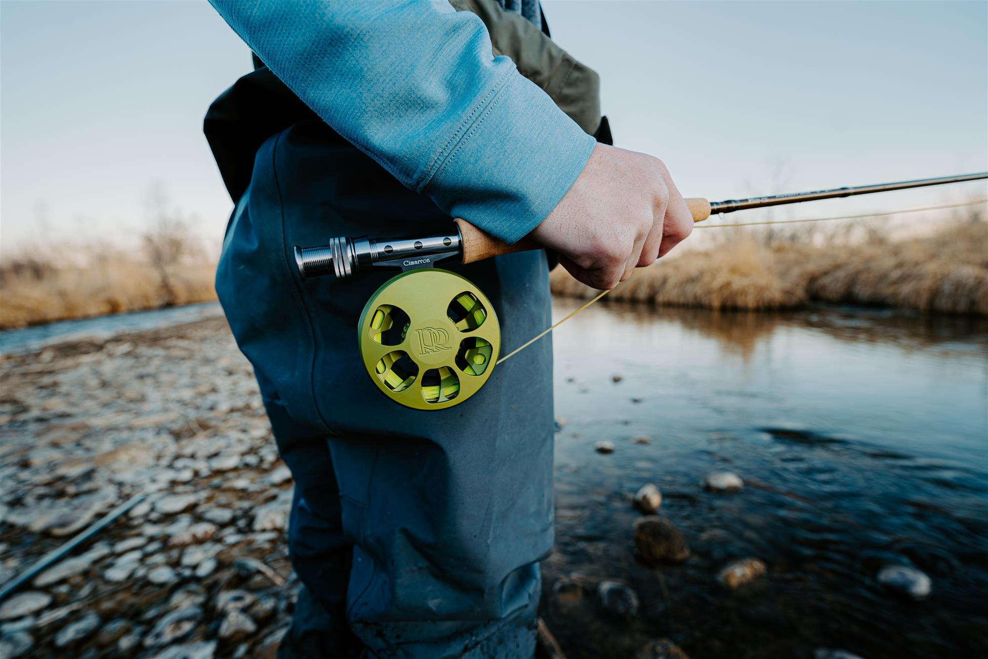 Ross Cimarron Creek trout fly reel mounted on fly rod streamside fishing setup