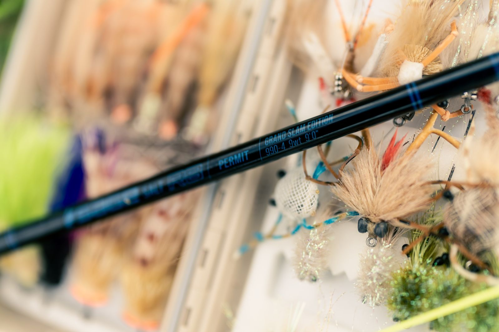 Sage SALT R8 Fly Rod Limited Edition Permit Grand Slam 990-4 laying by permit flies