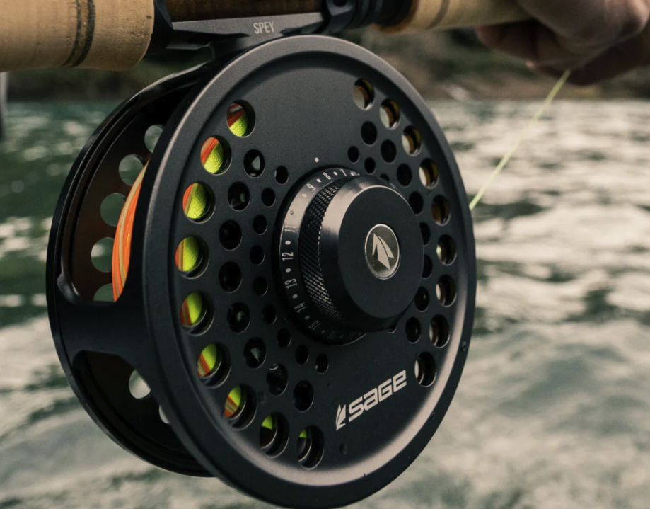 Sage SPEY 2 Fly Fishing Reel against a backdrop of a flowing river, demonstrating its suitability for freshwater spey fishing.