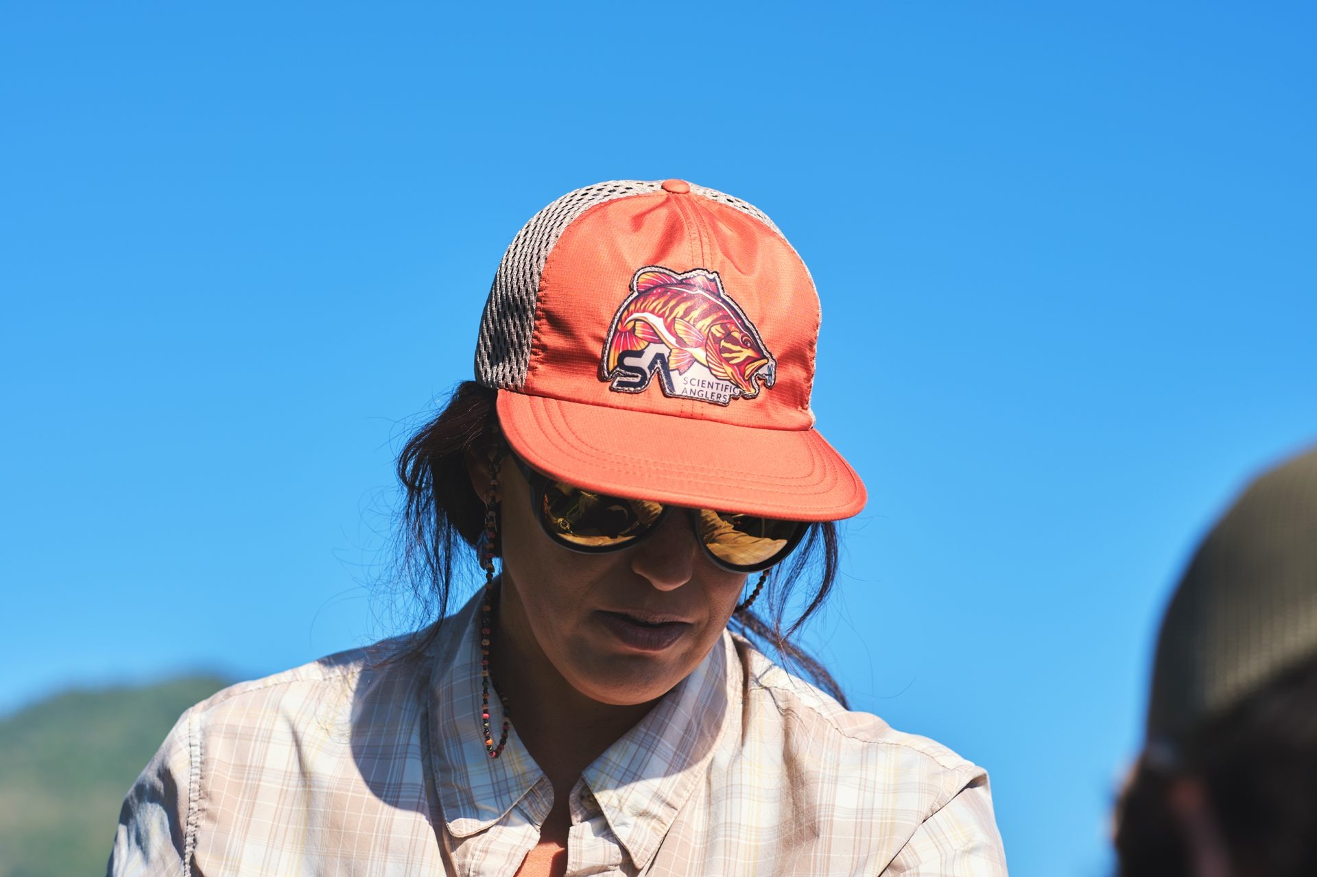 Scientific Anglers Quick Dry Packable Hat worn by angler for warm-weather fishing and outdoor use