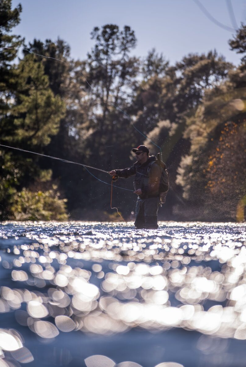 Fly angler fishing with Scott GT Fly Rod in river