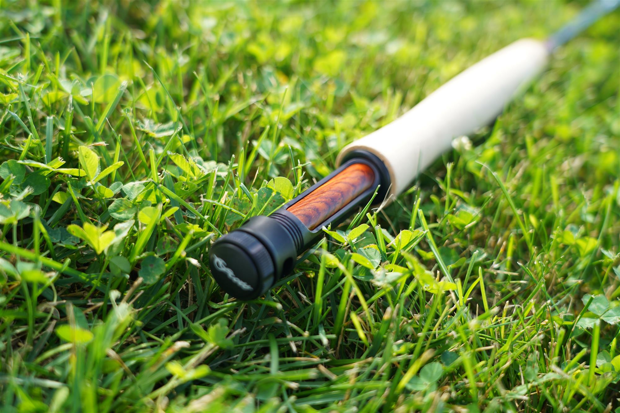 Scott GT Fly Rod Reel Seat laying in grass