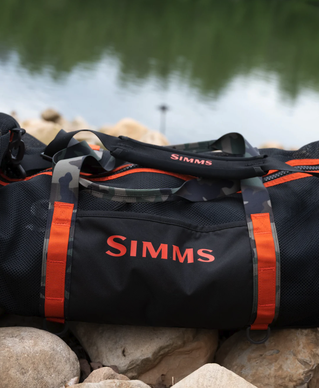 Top view of the wet-storage bag featuring a large two-way zipper for easy access to the main compartment.