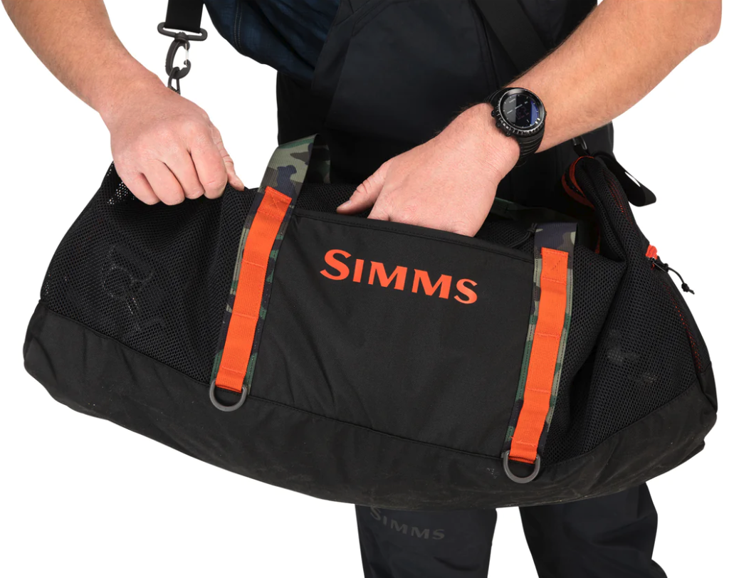 Side view of the wet-storage bag with a single side accessory pocket for key essentials.
