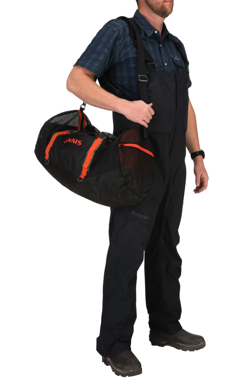 60L wet-storage bag designed to store damp gear like boots and outerwear while ensuring airflow.
