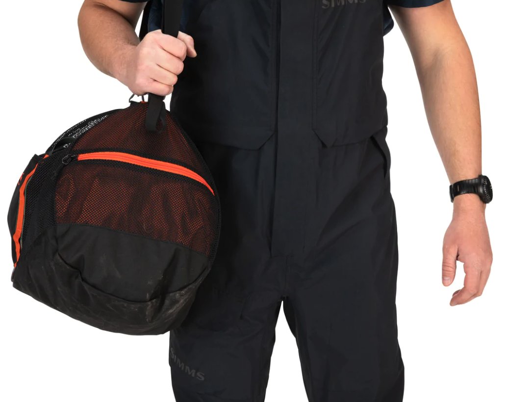 Detailed shot of the bag's rugged, recycled polyester base and DWR-coated fabric for durability.