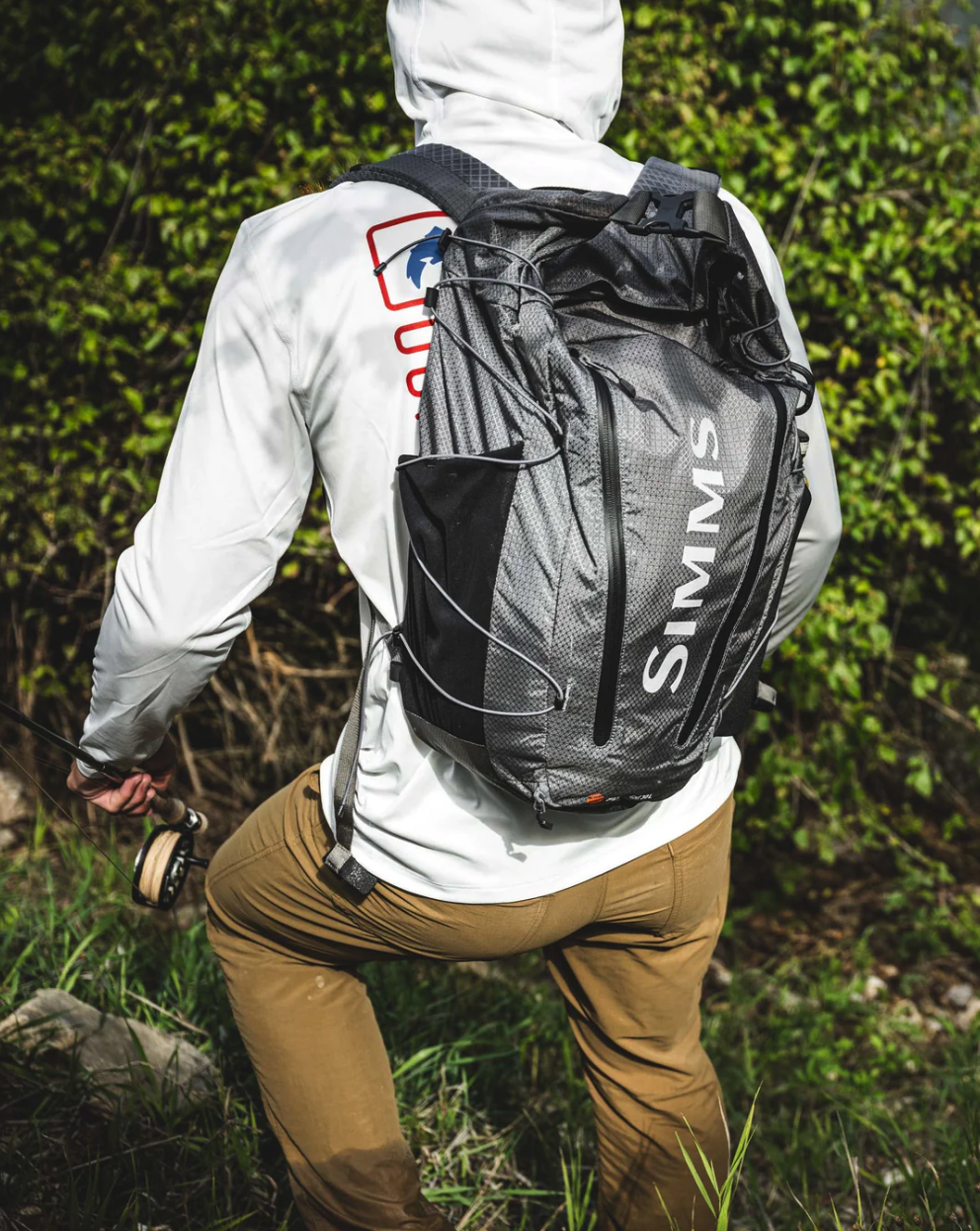 Durable Simms Flyweight Backpack with water-resistant construction for anglers.