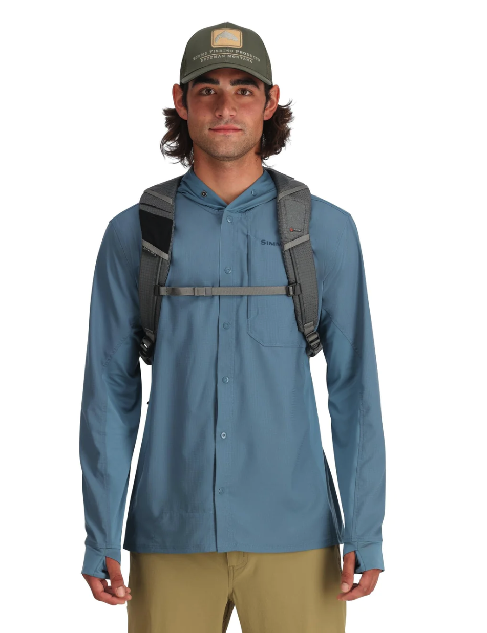 Simms Flyweight Backpack with ample space for fly fishing essentials.