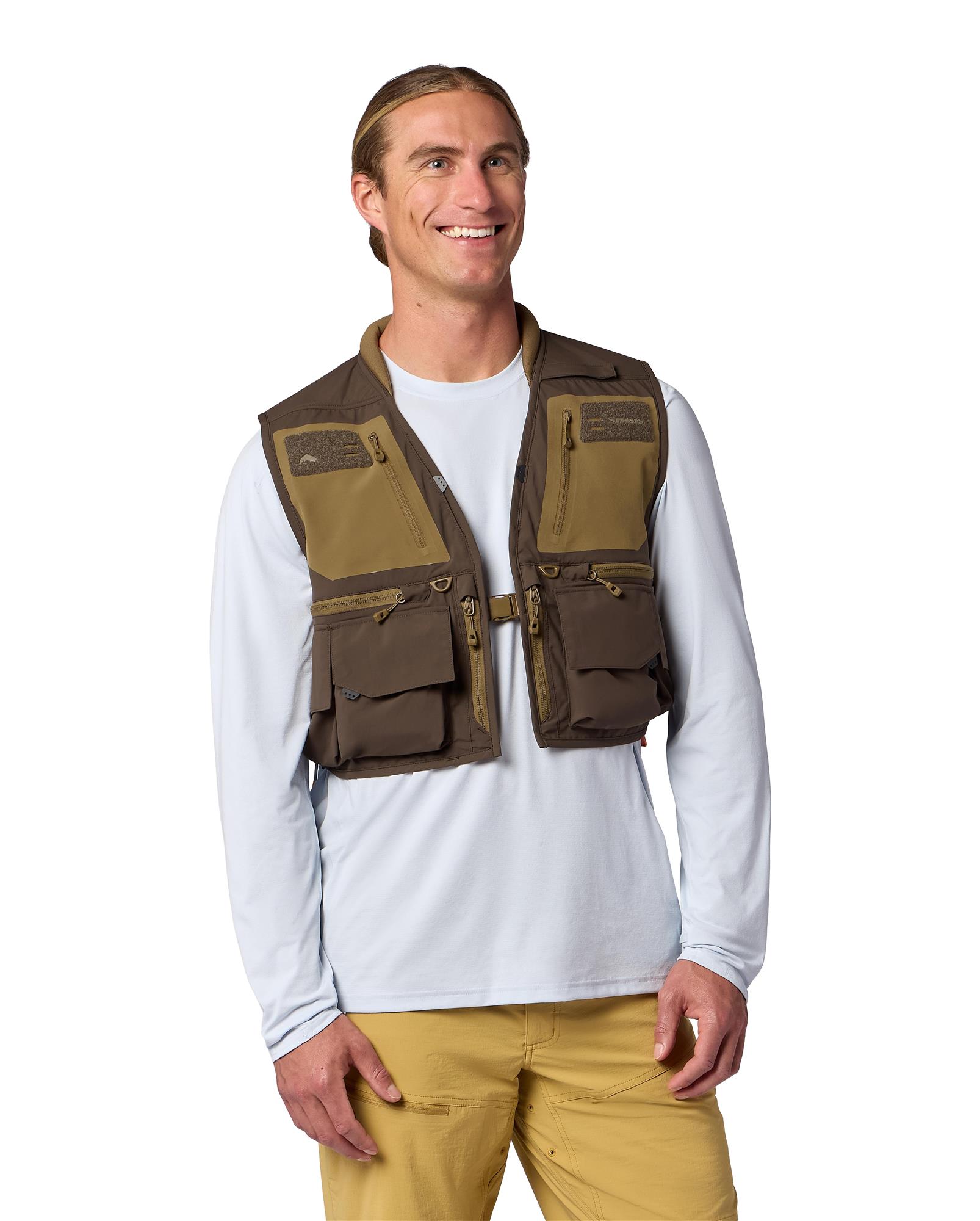 Simms Headwaters Vest worn front view—technical fly fishing vest with quick-access pockets and tool attachment points