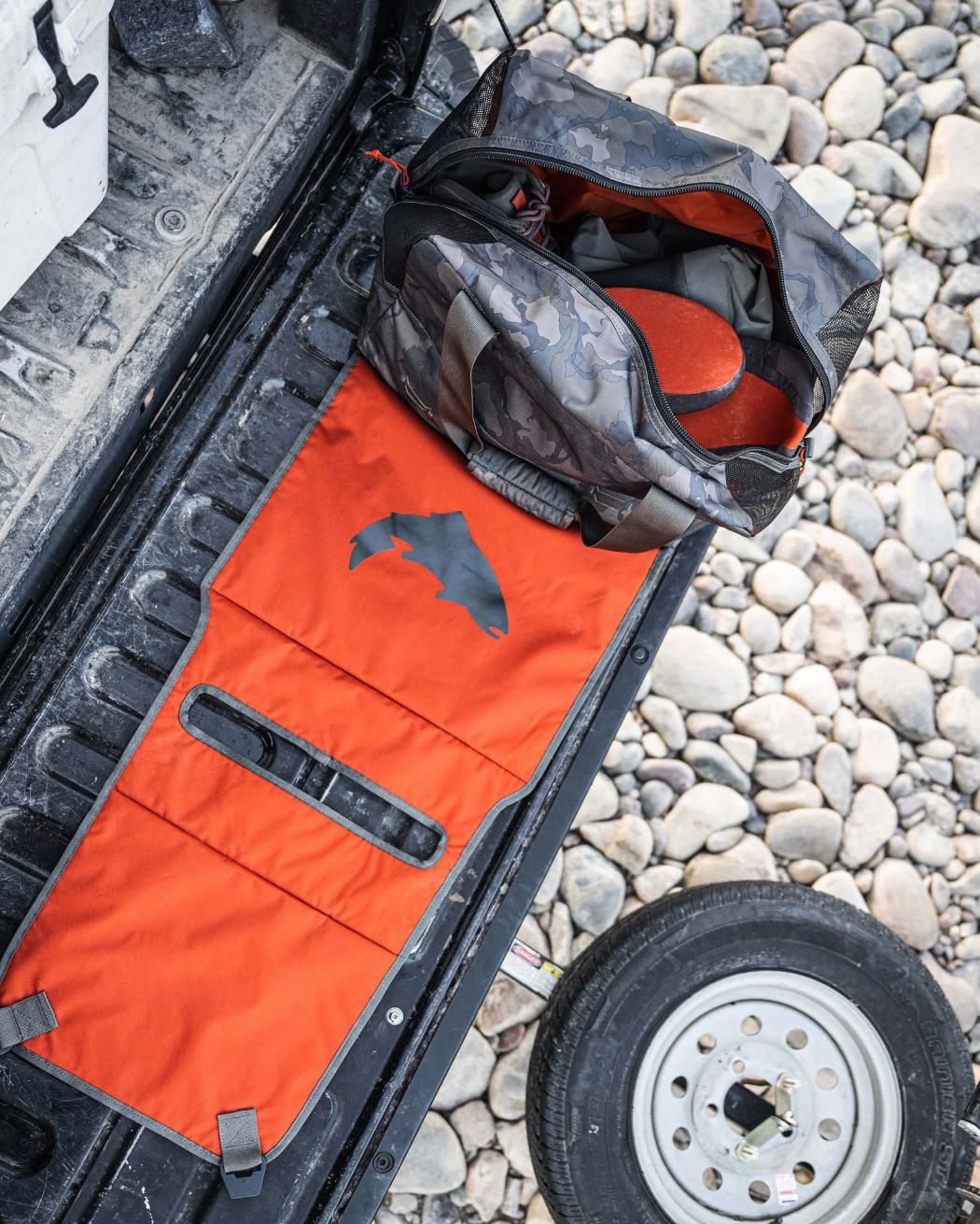 Breathable mesh Simms Wader Tote, padded lid for changing, available to order today.